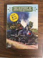 Front cover of DVD set showing steam locomotive and over 8.5 hours duration label.