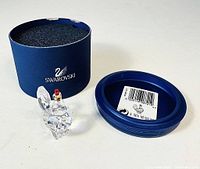Photo showing Swarovski crystal cockerel figurine with original blue round box and foam insert.