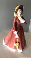 Front view of Royal Doulton Julia figurine showing detailed face and dress.