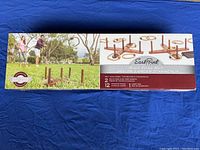 Front and top view of the ring toss set box showing product usage and contents