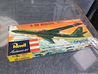 Full view of Revell IL-38 Bison airplane model kit box showing airplane illustration and logo.