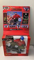 Full packaging view of Tyco RC Xtreme Tony Hawk Skateboard in red box with foam interior
