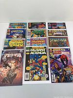 Full lot of Spider-Man comics arranged in 3 rows, showing front covers and condition.
