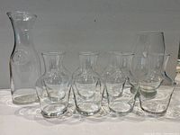 Full set of Sonora Ranch glassware including one large carafe and six glasses of assorted styles.