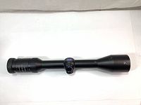 Full length view of Carl Zeiss Conquest 3.5-10x44 MC rifle scope showing matte black body and Zeiss logo on turret cap.