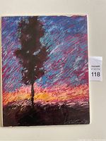 Full view of signed pastel artwork showing vibrant sunset colors with a tree silhouette.