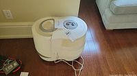 Top view of Honeywell humidifier showing the water tank opening and removable control knob.