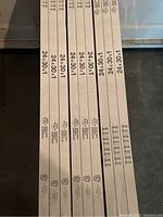 Side view of several air filters stacked showing size 24x30x1 and HDX branding