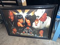 Full view of the framed artwork showing all featured musicians and the ornate black frame.