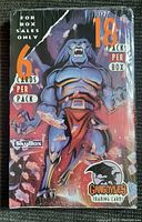 Front of the sealed box with illustration of gargoyle and box info