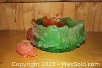 Wide-angle photo of the thick plastic bowl showing detailed sea life design.