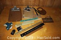 Full lot overview showing all items in the set on wooden table with wood panel background