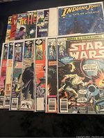 Eight front covers including Star Wars #12, Indiana Jones Fate of Atlantis and additional Marvel titles