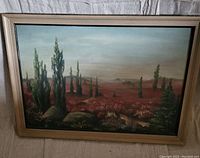 Front view of framed landscape painting by H. Ploschke showing vibrant colors and detailed trees.