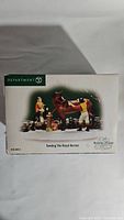 Box of Department 56 Dickens' Village Tending The Royal Horses figurine set
