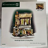 Box showing Department 56 branding and a photo of the Woodbridge Gazette & Printing Office from the New England Village series