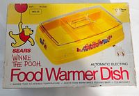 Box of the vintage Sears Winnie the Pooh Food Warmer Dish showing branding, product image, and vintage price sticker.