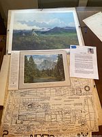 Overview of all lot items: two artwork prints, airplane plans, and letter about Don A Peters.