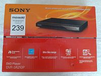 Front view of the sealed Sony DVD player box showing model number DVP-SR210P and branding