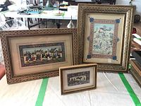 Three Persian art pieces framed with wood inlay, displayed on a surface, showing full lot layout.