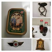 Photo showing China mint tin box, silver pocket watch with chain, unopened classic Coca-Cola bottles, Apple 2 computer wings pin, and Greek Orthodox icon reproduction