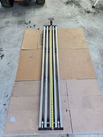 Aluminum plank measuring 72 inches shown with tape measure for length