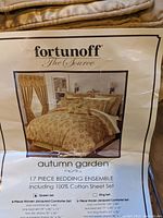 View of packaging label with product image and branding showing the queen size Autumn Garden 17-piece bedding ensemble from Fortunoff.