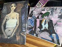 View showing both giclée artworks placed side by side, revealing image details and colors.