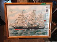 Front view of wood framed print depicting 'The Gospel Ship' with scriptural passages on the sails.