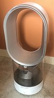 Full view of standalone Dyson AM10 humidifier showing loop amplifier and water tank