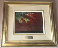 Framed limited edition print of Tom Thomson's Evening Clouds with gold plaque and beige mat.