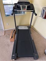 Front view of NordicTrack T5zi treadmill showing walking belt and frame.