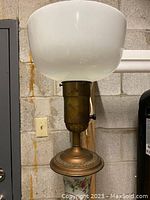 White milk glass shade and brass socket assembly
