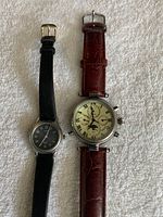 Topview of full watches side by side showing dials and straps