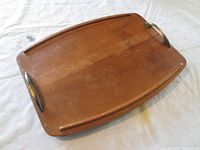 Top-down view of the rectangular wooden tray showing handle placements and surface wear