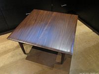 Square top view showing overall tabletop surface and wood grain