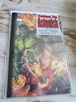 Front cover of 'Tales To Astonish' comic showing Hulk and other characters, sealed in protective plastic sleeve.
