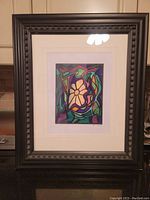 Frontal photo of the original acrylic painting by Don Chase, showing the artwork, matting, and frame with lighting reflection on glass.