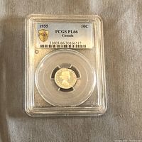 Front view of Canadian 10 cent coin in PCGS protective slab showing obverse with Queen Elizabeth II and grading label.