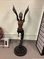 Front view of statue and base