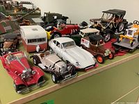Wide view showing all models arranged on green surface