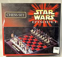 Box front displaying Star Wars Episode 1 Chess Set with an image of the chessboard and pieces.