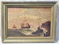 Front view of framed print showing sailing ships with clouds and dock area