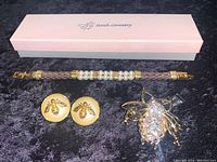 Sarah Coventry bracelet with faux pearls and beads, bee button earrings, and large banana republic bee brooch