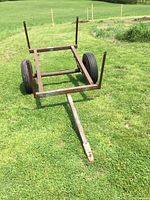 Front view showing A-frame tongue, ball coupler, steel frame and wheels