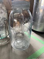 Single Beaver jar showing embossed logo and metal screw band lid