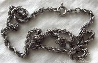 Close-up photo of the vintage 925 sterling silver rope chain necklace showing the twisted rope design and spring ring clasp.