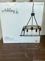 Photo of Ashley Harbour Lighting box showing the product image and brand name.