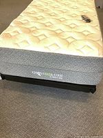 GhostBed Luxe twin mattress on adjustable metal base