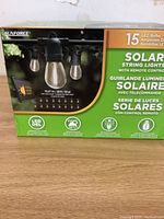 Box front showing the brand Sunforce, 15 LED bulbs, and 35 ft cable length along with indication of remote control